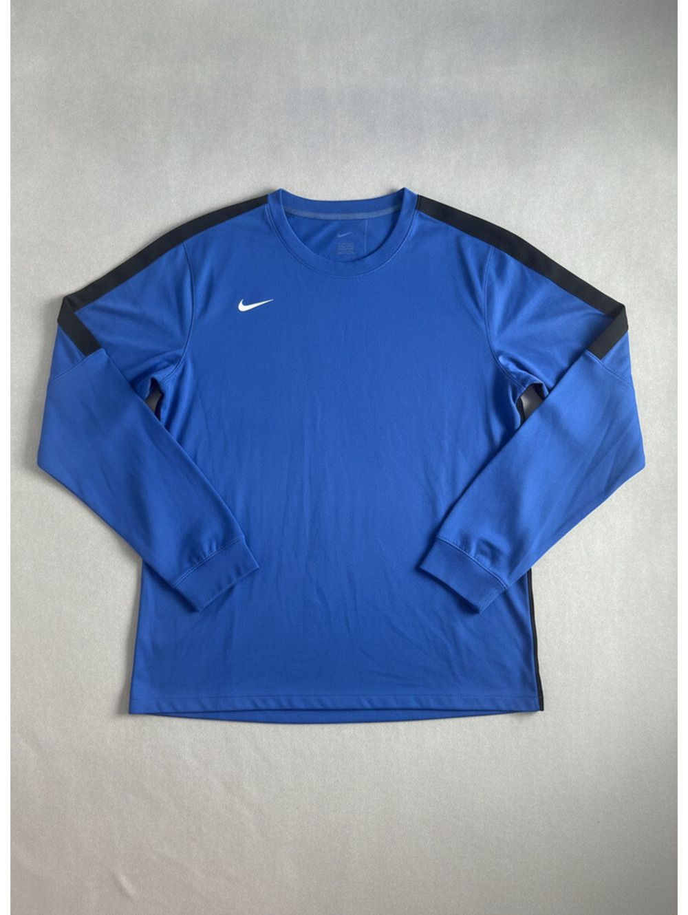 Nike Men's Blue Long Sleeve Shirt with Black Stripe Accents, Very Good Condition